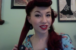 Roll hair onto curler, and continue rolling up. 